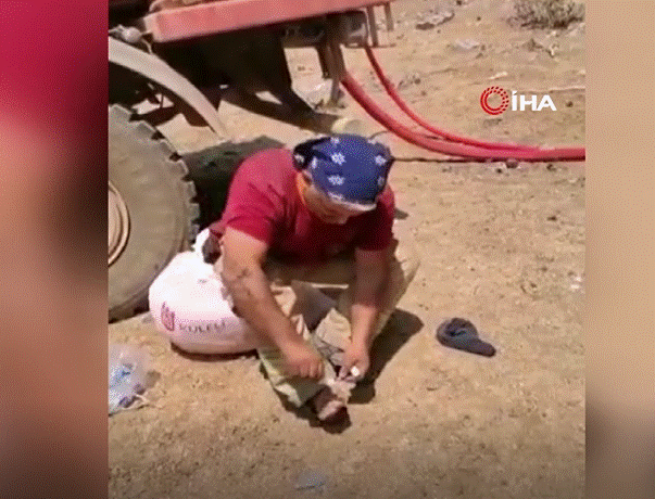 Basınçlı boruyla kafasından yaralandı, söndürme çalışmalarına devam etti